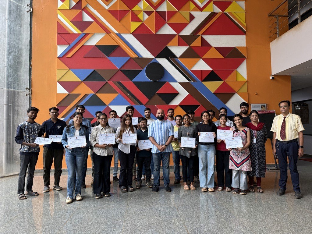 Participants with their course completion certificates